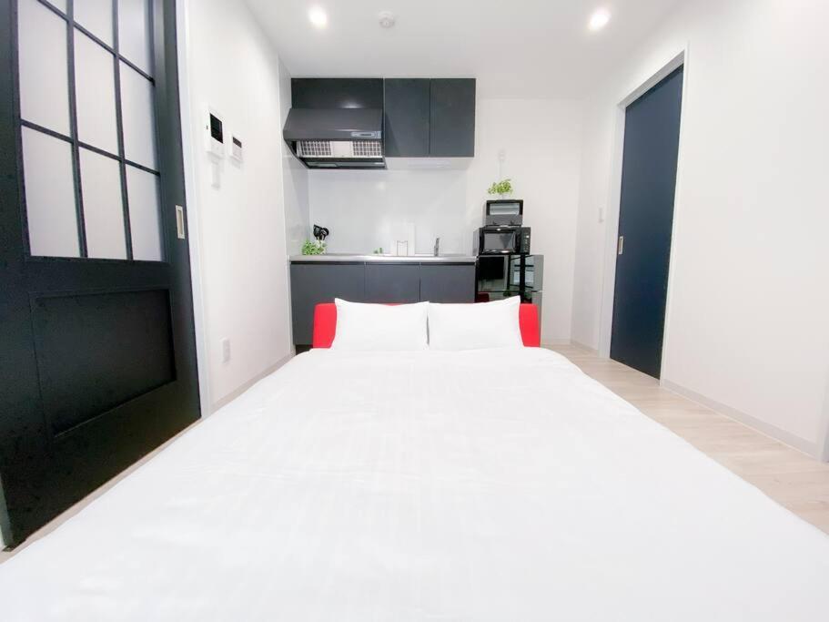 Residential Hotel Glitter Usjまで1駅5分 Osaka Pokój zdjęcie